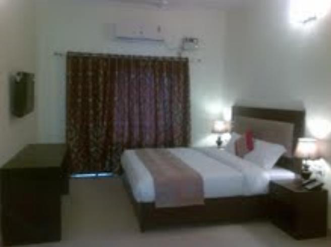 Chitra Grand Hotel Haridwar Room photo